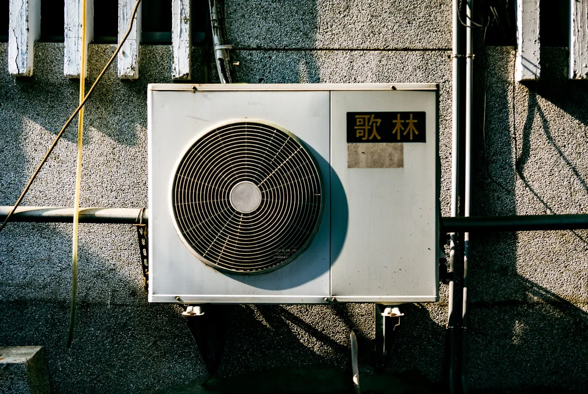 Technician installing an AC unit